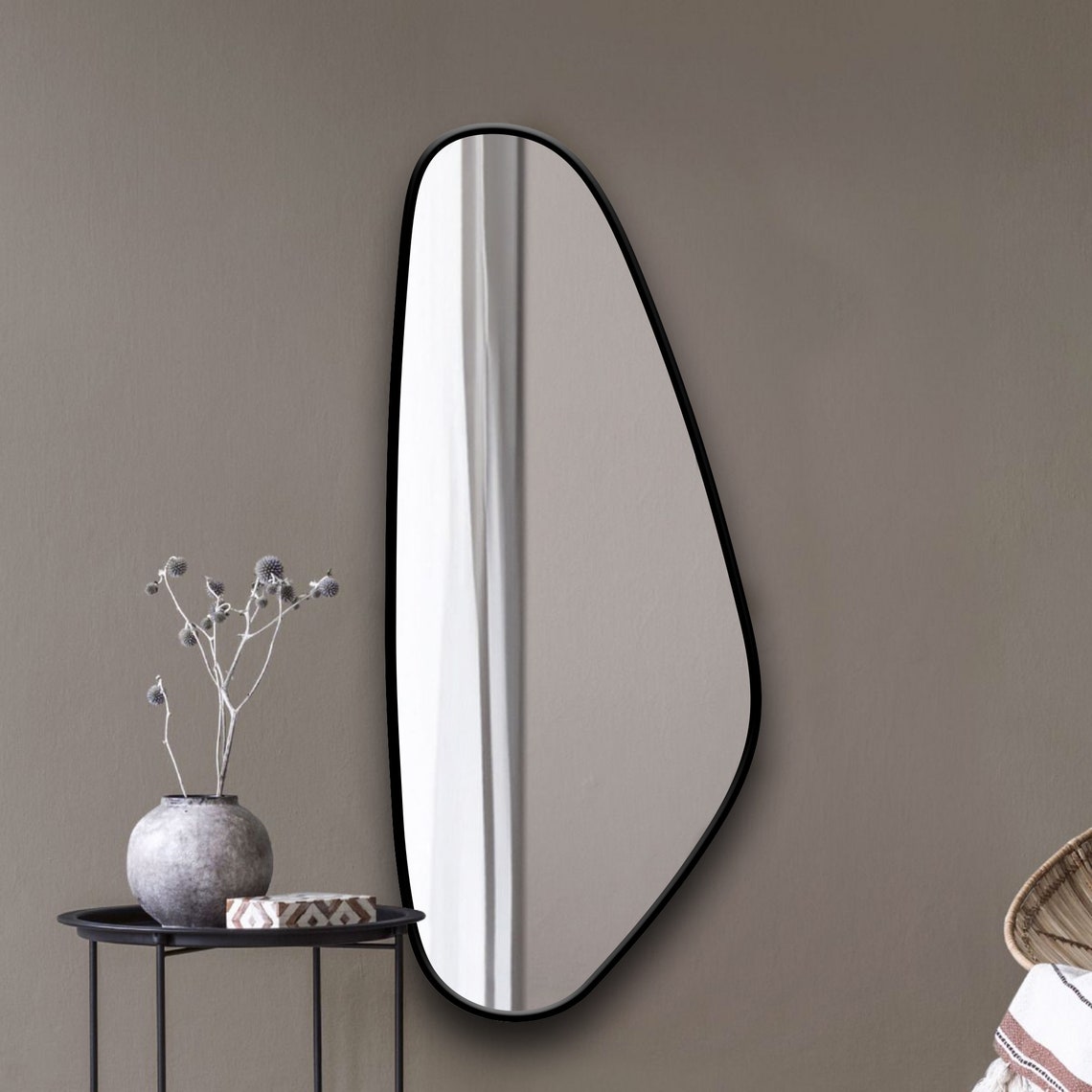 asymmetrical mirror