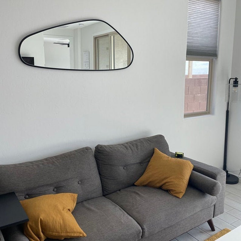 asymmetrical mirror
